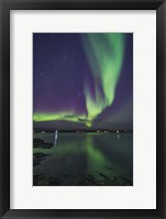 A Curtain of Aurora Sweeps Over the Houseboats Moored On Yellowknife Bay Fine Art Print