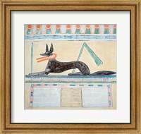 Anubis, Egyptian god of the dead, lying on top of a sarcophagus Fine Art Print