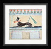 Anubis, Egyptian god of the dead, lying on top of a sarcophagus Fine Art Print