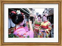 Three geishas, Kyoto, Honshu, Japan (taking pictures) Fine Art Print