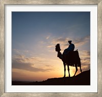 Silhouette of a man on a camel, Giza, Egypt Fine Art Print