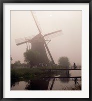 Windmill and Cyclist, Zaanse Schans, Netherlands black and white Fine Art Print