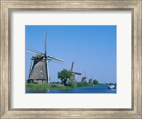 Windmills and Canal Tour Boat, Kinderdijk, Netherlands Fine Art Print
