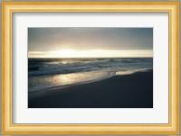 Waves breaking on the beach at sunrise Fine Art Print