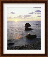 Rocks on the beach at sunrise Fine Art Print
