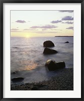 Rocks on the beach at sunrise Fine Art Print