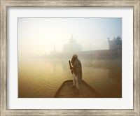 Silhouette of a man standing on a boat in the Yamuna River, Taj Mahal, Agra, Uttar Pradesh, India Fine Art Print