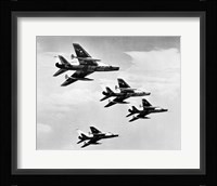 Low angle view of four fighter planes flying in formation, F-100 Super Sabre Fine Art Print