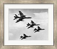 Low angle view of four fighter planes flying in formation, F-100 Super Sabre Fine Art Print