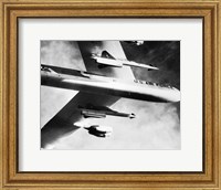 Low angle view of a bomber plane carrying missiles during fight, AGM-28 Hound Dog, B-52 Stratofortress Fine Art Print