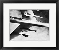 Low angle view of a bomber plane carrying missiles during fight, AGM-28 Hound Dog, B-52 Stratofortress Fine Art Print