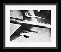 Low angle view of a bomber plane carrying missiles during fight, AGM-28 Hound Dog, B-52 Stratofortress Fine Art Print