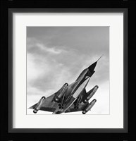 Low angle view of a bomber plane in flight, B-58 hustler Fine Art Print