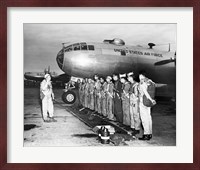 Group of army soldiers standing in a row near a fighter plane, B-29 Superfortress Fine Art Print
