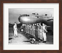 Group of army soldiers standing in a row near a fighter plane, B-29 Superfortress Fine Art Print