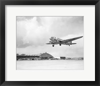 Low angle view of a military airplane landing, Douglas DC-3 Fine Art Print