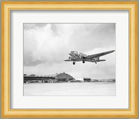 Low angle view of a military airplane landing, Douglas DC-3 Fine Art Print