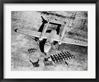 High angle view of soldiers standing near a military airplane, Fairchild C-119 Flying Boxcar Fine Art Print