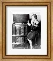 Young woman sitting beside an RCA Radio-Phonograph and Home Recorder Fine Art Print