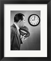 Businessman looking at clock Fine Art Print
