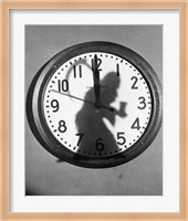 Close-up of the shadow of a person carrying a scythe on a clock Fine Art Print