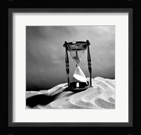 Close up of hourglass on sand Fine Art Print
