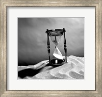 Close up of hourglass on sand Fine Art Print
