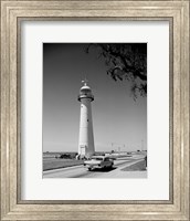 USA, Mississippi, Biloxi, Biloxi Lighthouse with street in the foreground Fine Art Print