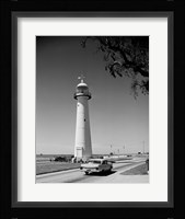 USA, Mississippi, Biloxi, Biloxi Lighthouse with street in the foreground Fine Art Print