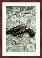 Close-up of a handgun with paper currency Fine Art Print