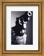 Close-up of a person holding a handgun Fine Art Print