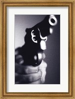 Close-up of a person holding a handgun Fine Art Print