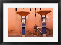 Public telephone booths in front of a wall, Morocco Fine Art Print