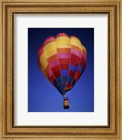 Low angle view of a hot air balloon rising, Albuquerque International Balloon Fiesta, Albuquerque, New Mexico, USA Fine Art Print
