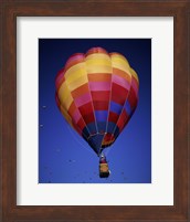 Low angle view of a hot air balloon rising, Albuquerque International Balloon Fiesta, Albuquerque, New Mexico, USA Fine Art Print