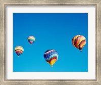 4 Rainbow Hot Air Balloons in the Bright Blue Sky Fine Art Print