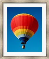 Low angle view of a hot air balloon in the sky, New Mexico, Rainbow Fine Art Print