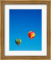 Green and Red Hot Air Balloons Taking Off Fine Art Print