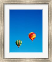 Green and Red Hot Air Balloons Taking Off Fine Art Print