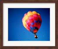 Lone Hot Air Balloon with Other Hot Air Balloons in the Distance Fine Art Print