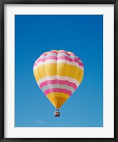 Low angle view of a hot air balloon in the sky, Albuquerque, New Mexico, Yellow & Pink Fine Art Print