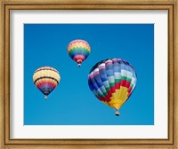 3 Multi-Colored Hot Air Balloons Flying Fine Art Print