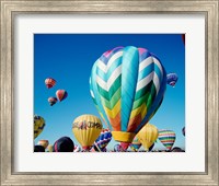 Low angle view of hot air balloons taking off, Albuquerque International Balloon Fiesta, Albuquerque, New Mexico, USA Fine Art Print