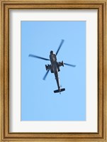 Low angle view of a military helicopter in flight Fine Art Print