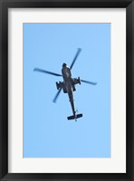 Low angle view of a military helicopter in flight Fine Art Print