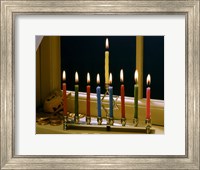 Close-up of a menorah with burning candles and a Star of David Fine Art Print
