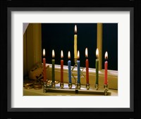 Close-up of a menorah with burning candles and a Star of David Fine Art Print