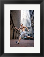 Side profile of a young man running in a city Fine Art Print