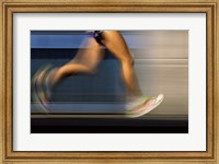Low section view of a person running on blue Fine Art Print