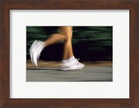 Low Section View Of A Person Running In White Sneakers Fine Art Print